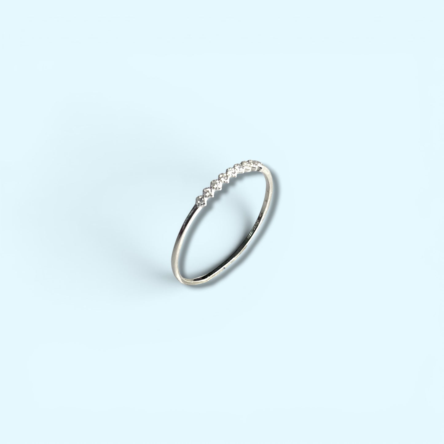 Nine CZ -Sterling Silver Ring