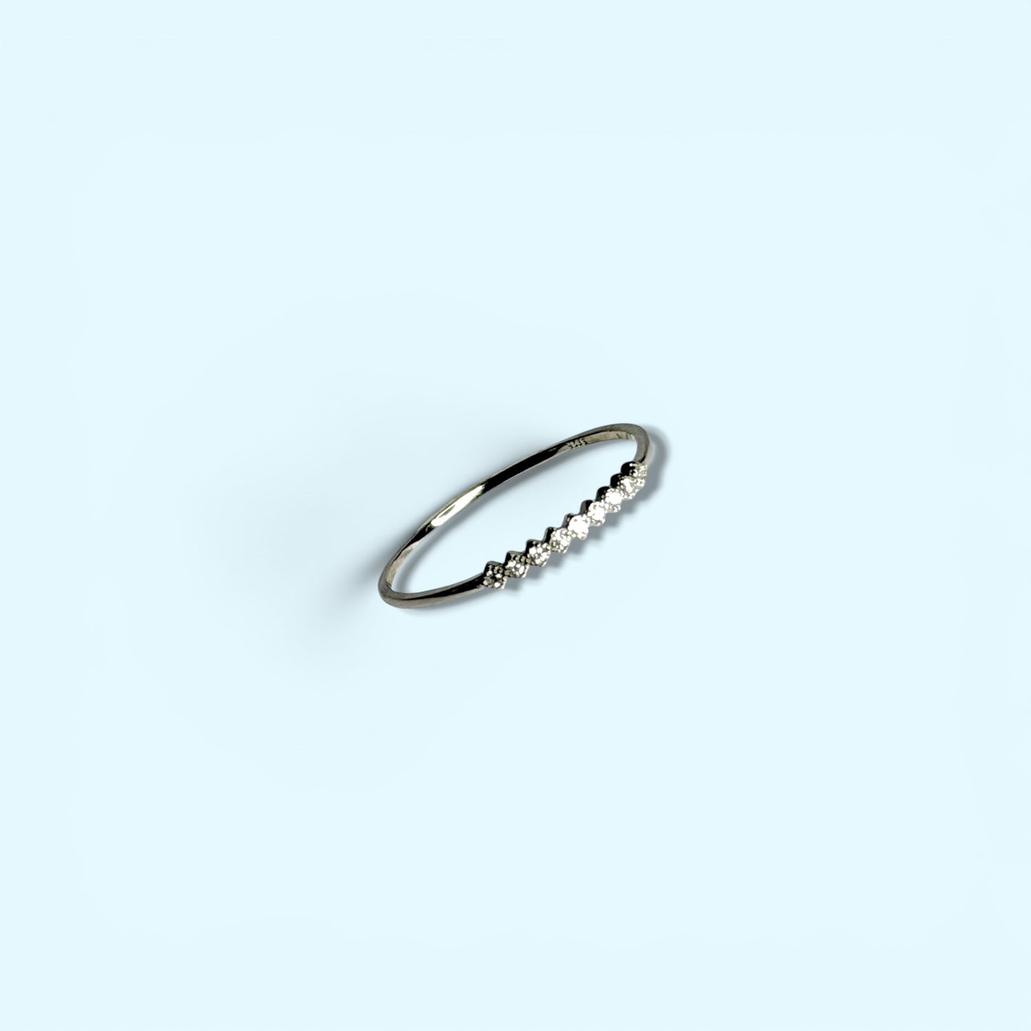 Nine CZ -Sterling Silver Ring